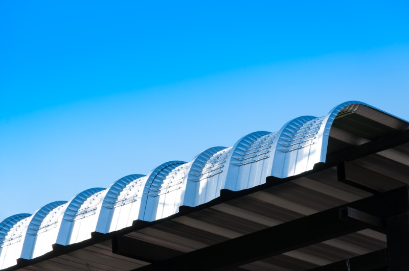 Metal,Sheet,Roof,Curve,On,Blue,Sky,Modern,Construction.,Metal,Ribbed