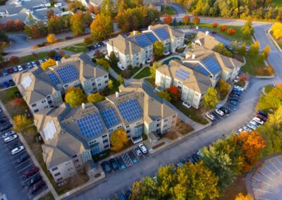 Aerial,View,Of,Apartment,Buildings,With,Solar,Panel,Installed,On