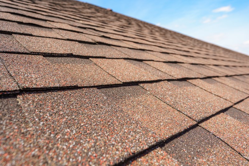 Close,Up,Photo,Of,Asphalt,Shingles,Layer,On,Top,Of